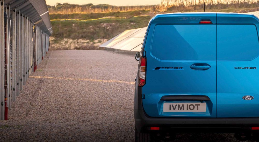 Ford E-Transit Courier - Rear View The rear doors of a new Ford E-Transit Courier van in Digital Aqua Blue.