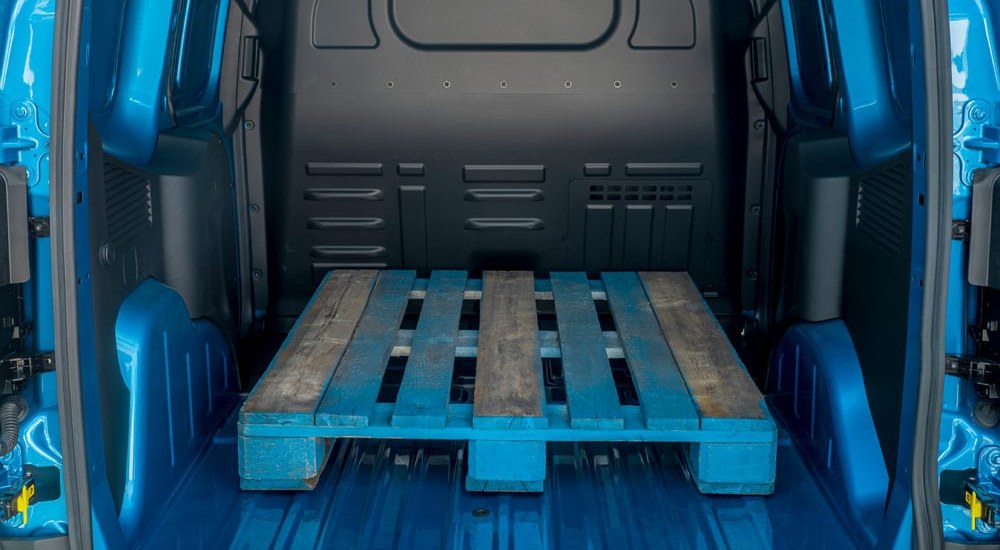 A Euro pallet in the cargo space of a new Ford E-Transit Courier.