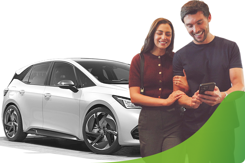 A couple look at a phone in front of a white car; bad credit car finance specialists image.