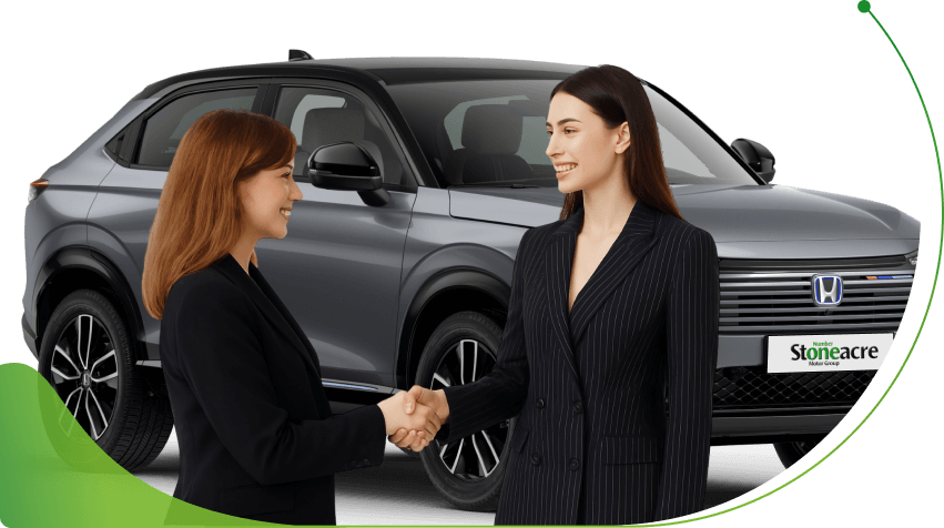 Two women shake hands in front of a grey Honda HR-V; Applying for 0% interest car finance image