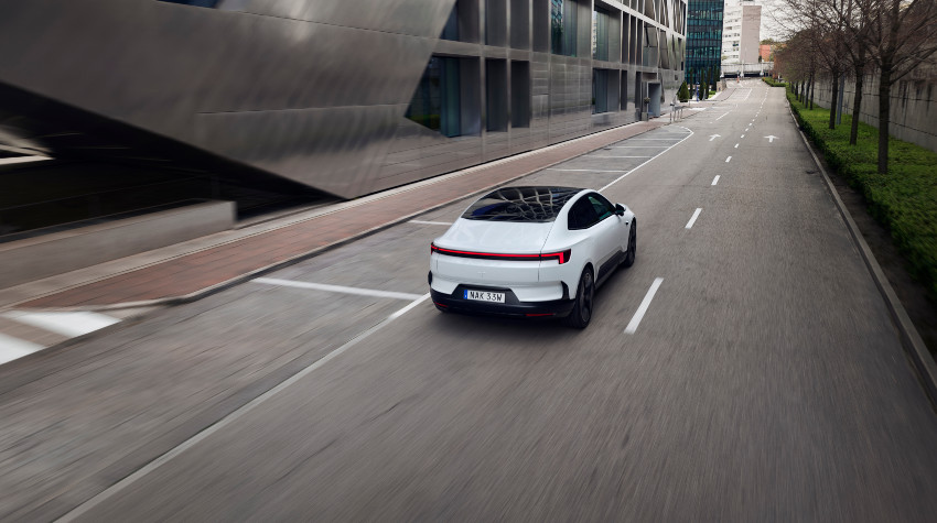 A white Polestar 4 on an empty road; How to drive an electric car intro image