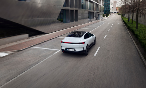 A white Polestar 4 on an empty road; How to drive an electric car intro image