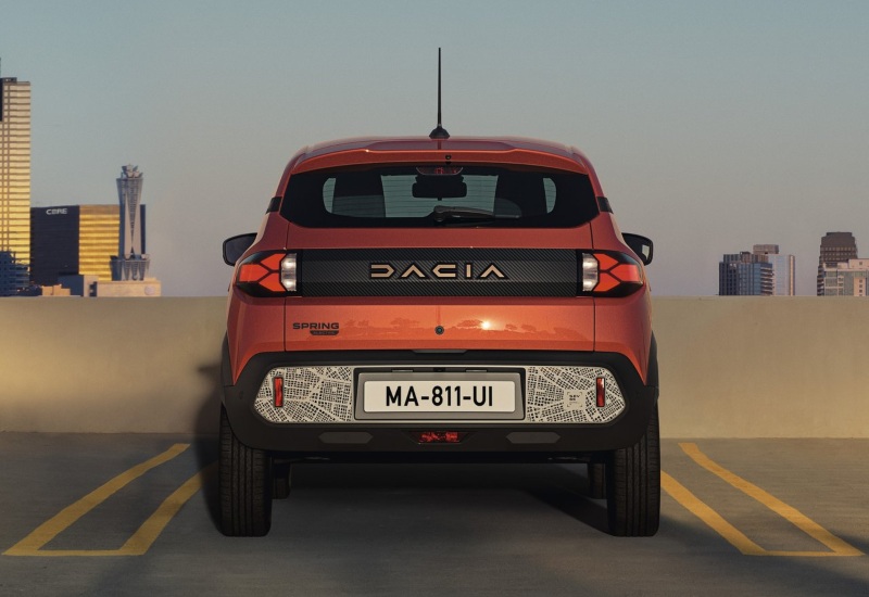 A used Dacia Spring Extreme showing its 308-litre boot and distinctive rear bumper.