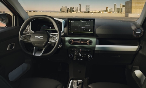 Used Dacia Spring Interior The interior of a used Dacia Spring, showing the dashboard, steering wheel, and centre console.