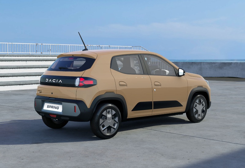 A used Dacia Spring Expression using its rear parking sensors while reversing.