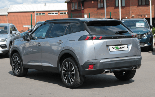 The rear profile of a silver Peugeot 2008; What is the difference between CS Finance Vs HP image
