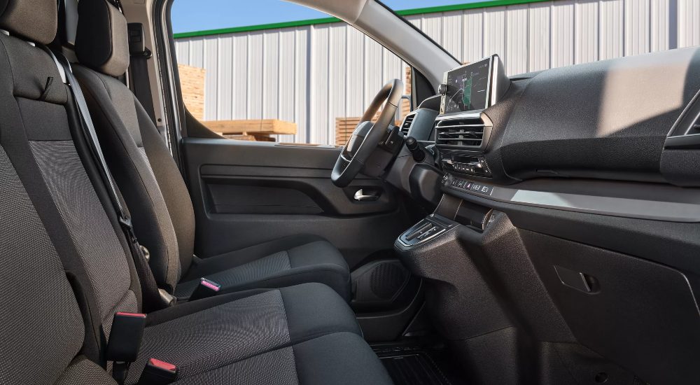 New Toyota Proace van interior with comfortable seats, practical storage, and an advanced infotainment system.