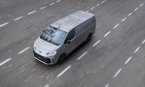 The new Toyota Proace Electric van in silver, showcasing a modern front design and versatile panel van styling.
