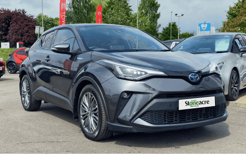 A grey Toyota C-HR and the FCA logo; Stoneacre and the FCA image