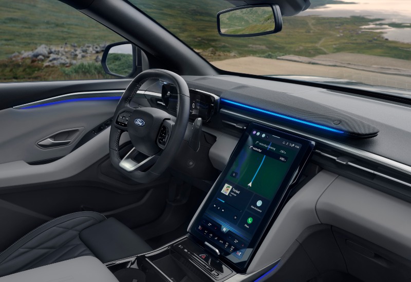 Used Ford Explorer Interior Used Ford Explorer interior with Sensico seats, steering wheel, and large portrait touchscreen display.