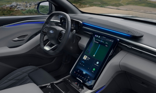 Used Ford Explorer Interior Used Ford Explorer interior with Sensico seats, steering wheel, and large portrait touchscreen display.