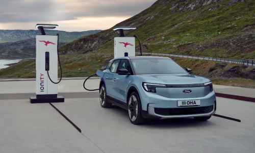 Used Ford Explorer for Sale Used Ford Explorer for sale in Arctic Blue, plugged into a fast charging point.