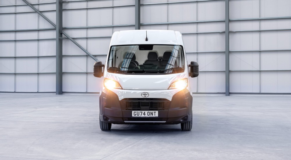 Proace Max for Sale The new Toyota Proace Max for sale, headlights on in a warehouse.