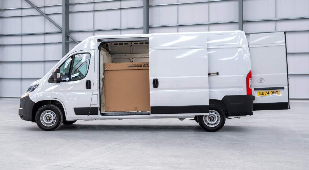 Proace Max Diesel The new Toyota Proace Max diesel van, side view with sliding door open.