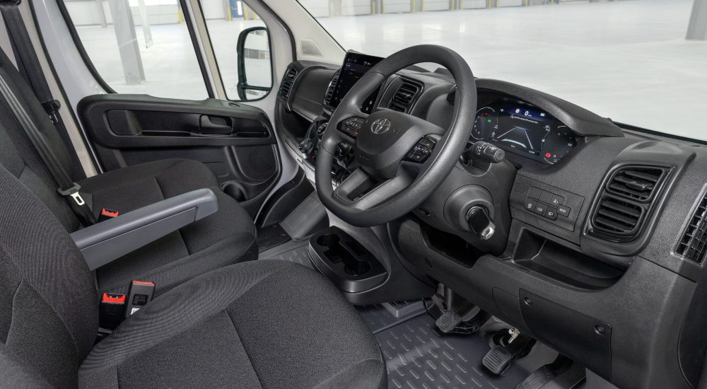 Proace Max Interior The new Toyota Proace Max interior, showing the driver’s seat, steering wheel, and digital dashboard.