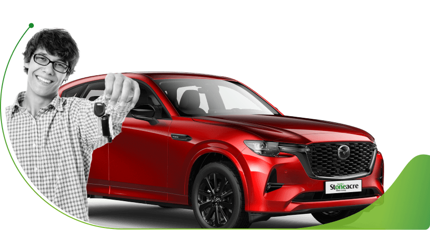 Make holds car key in front of red Mazda SUV; Can I Get Car Finance as a Young Driver image