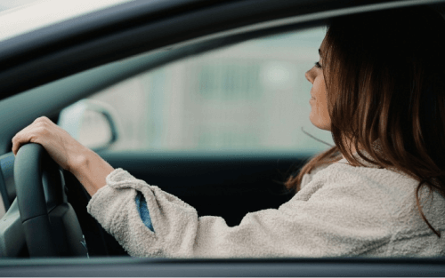 A woman in a car; Blue Motor Finance at Stoneacre image