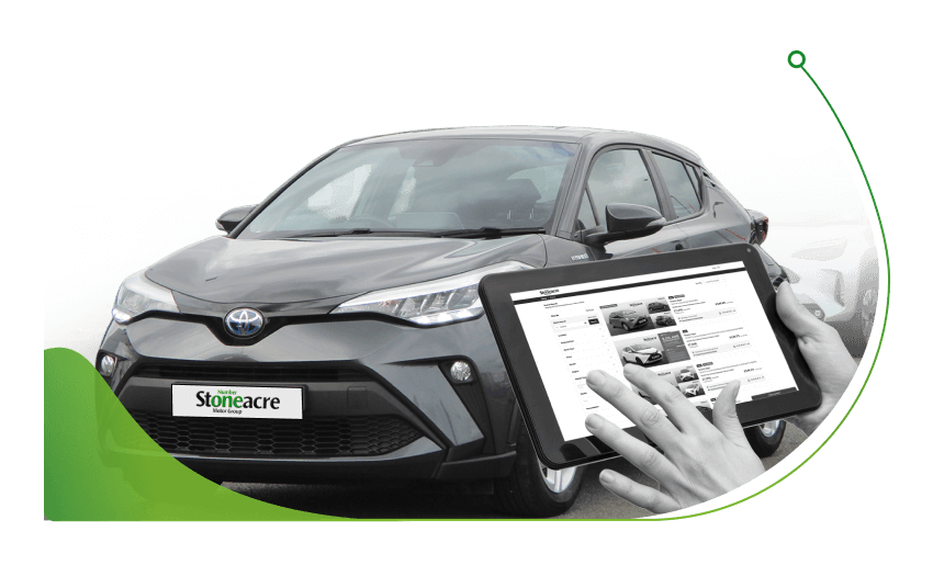A tablet in front of a Toyota C-HR; How to Choose the Right Used Car Finance Deal - image