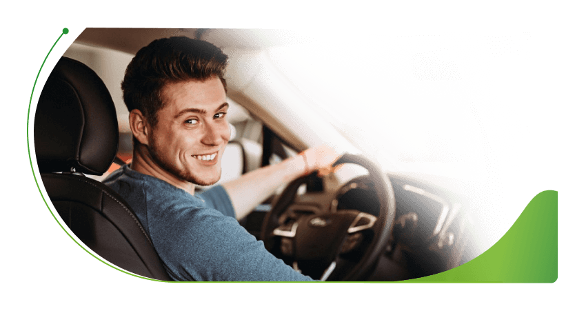 A man at the wheel of a car; About Go Car Credit image