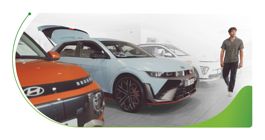 A man walks through a Hyundai showroom; Pros & Cons to the balloon payment image