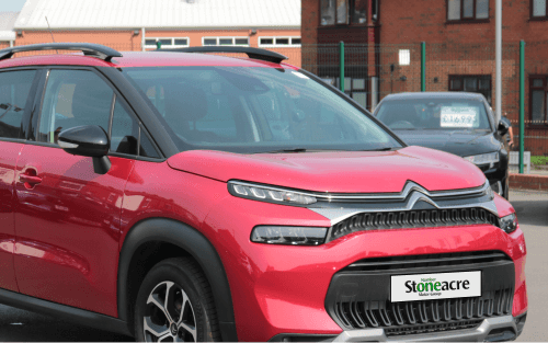 A red Citroen C3 Aircross; Can someone with a low credit score finance two cars image
