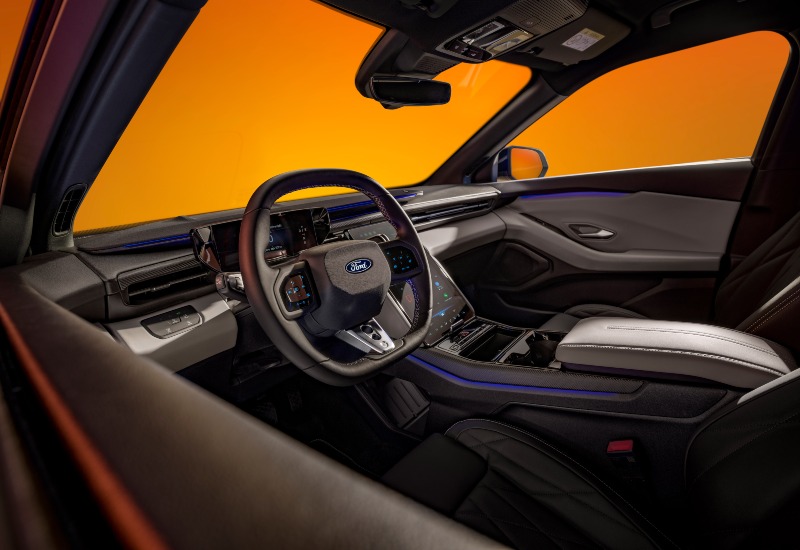 Used Ford Capri Interior Used Ford Capri interior showing the steering wheel, seats, and portrait touchscreen.