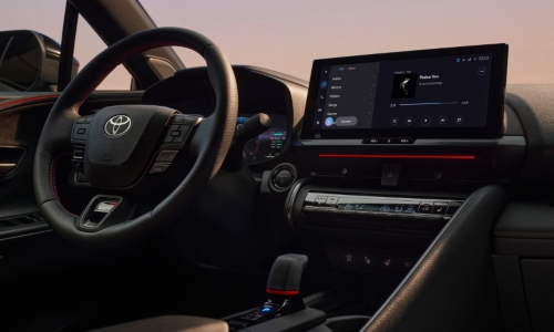 Used Toyota C-HR Hybrid Interior Used Toyota C-HR Hybrid interior with steering wheel controls and a central touchscreen.