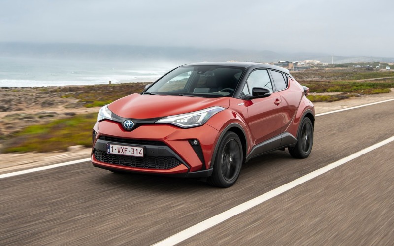 Used Toyota C-HR Hybrid Orange Edition in orange and black paint.
