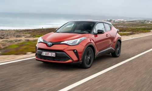 Used Toyota C-HR Hybrid Used Toyota C-HR Hybrid Orange Edition in orange and black paint.