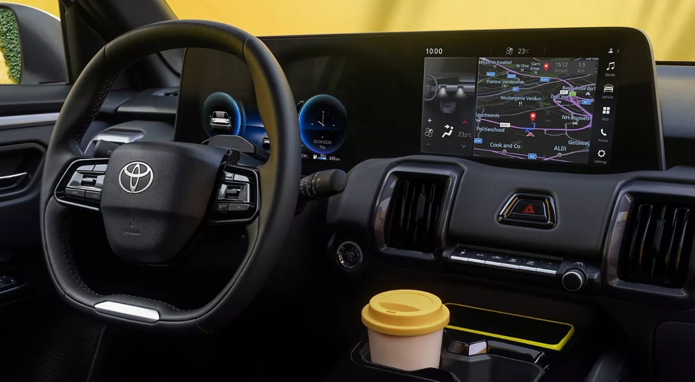 Toyota Urban Cruiser interior with a digital combimeter and a central touchscreen.