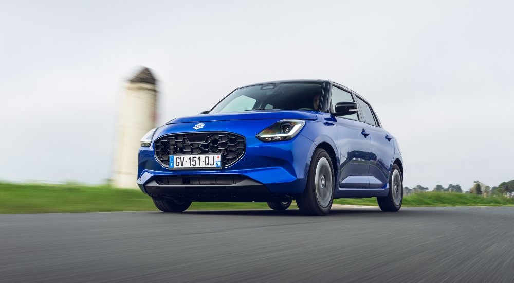 Front three-quarter view of the new Suzuki Swift in Frontier Blue