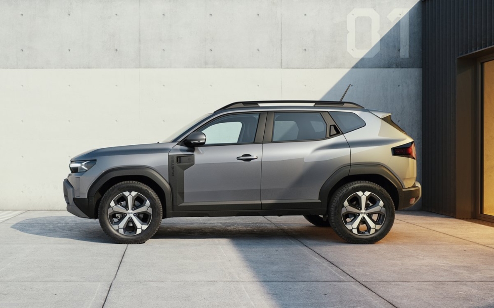 Side profile view of a Dacia Duster SUV, highlighting the exterior design and proportions.