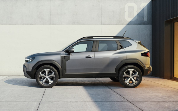 Side profile view of a Dacia Duster SUV, highlighting the exterior design and proportions.