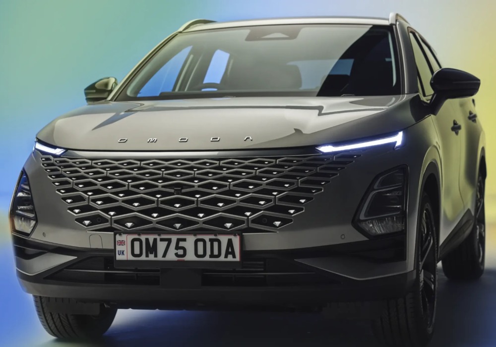 Front of an OMODA 5, showing off the unique grille and led headlights, with a colourful background