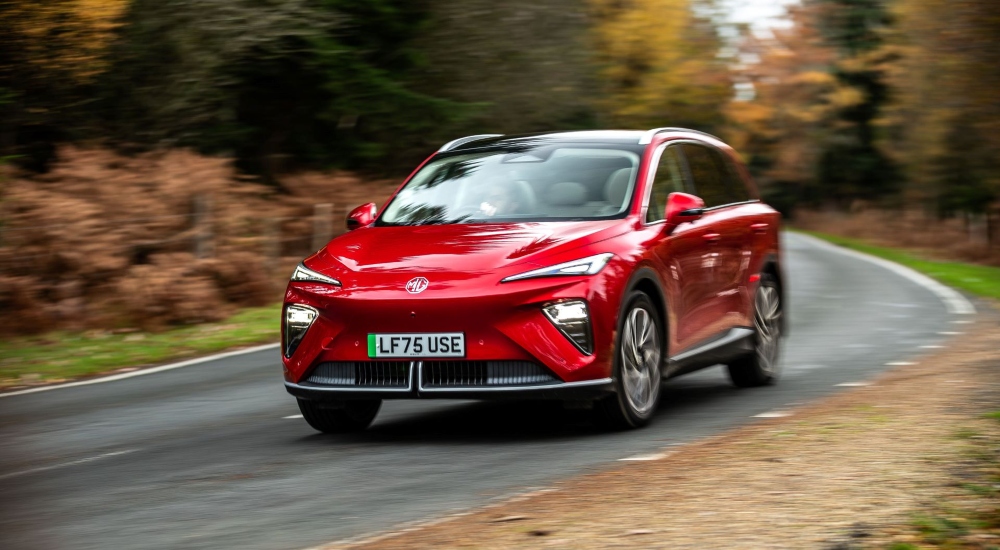 A New MGS6 EV in Dynamic Red driving on the road; New MGS6 EV performance