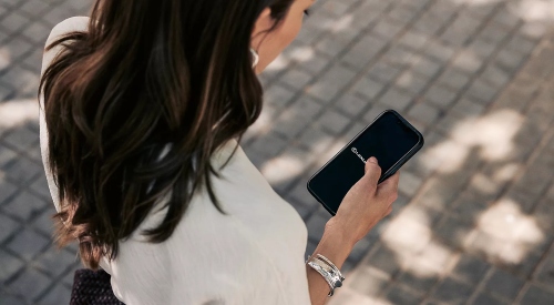 A person using the Lexus Link+ App; New All-Electric Lexus RZ technology