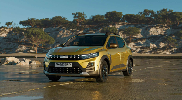 Dacia Sandero Stepway in Amber Yellow with a bold front grille and distinctive LED headlights.