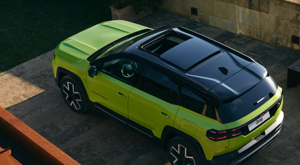 New Jeep Compass in Hawaii green with the panoramic sunroof available in the Premium Pack; New Jeep Compass Full-Electric car for sale