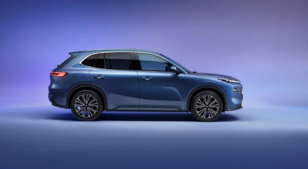 New Geely Starray EM-i in Glacier Blue, side view against a studio background.