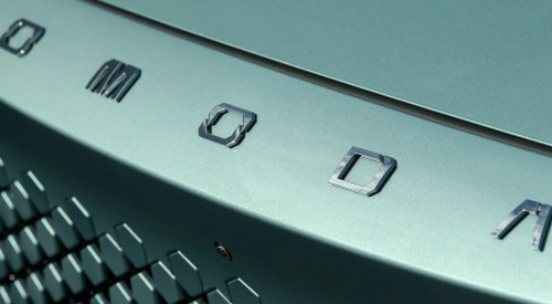 Close up shot of an OMODA car, showing off the badging and unique front grille