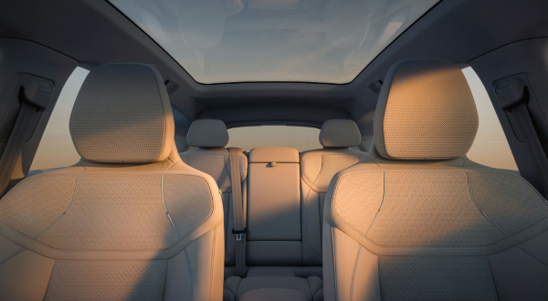 Volvo EX60 interior with Dawn seats and panoramic glass roof above the rear cabin.