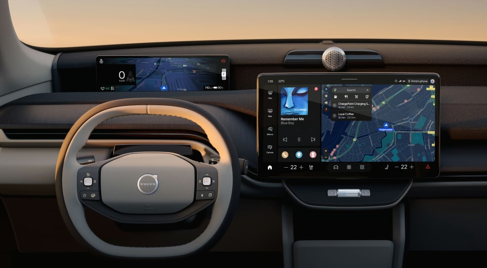 Interior dashboard of the Volvo EX60 featuring the large touchscreen and Dawn upholstery.
