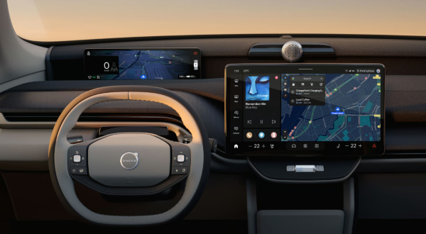 Interior dashboard of the Volvo EX60 featuring the large touchscreen and Dawn upholstery.