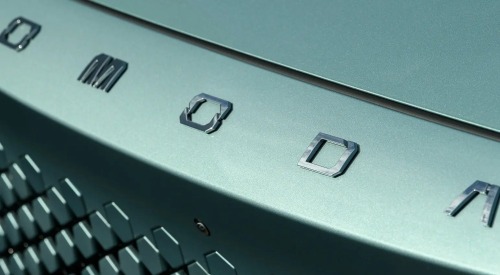 Close up shot of an OMODA car, showing off the badging and unique front grille