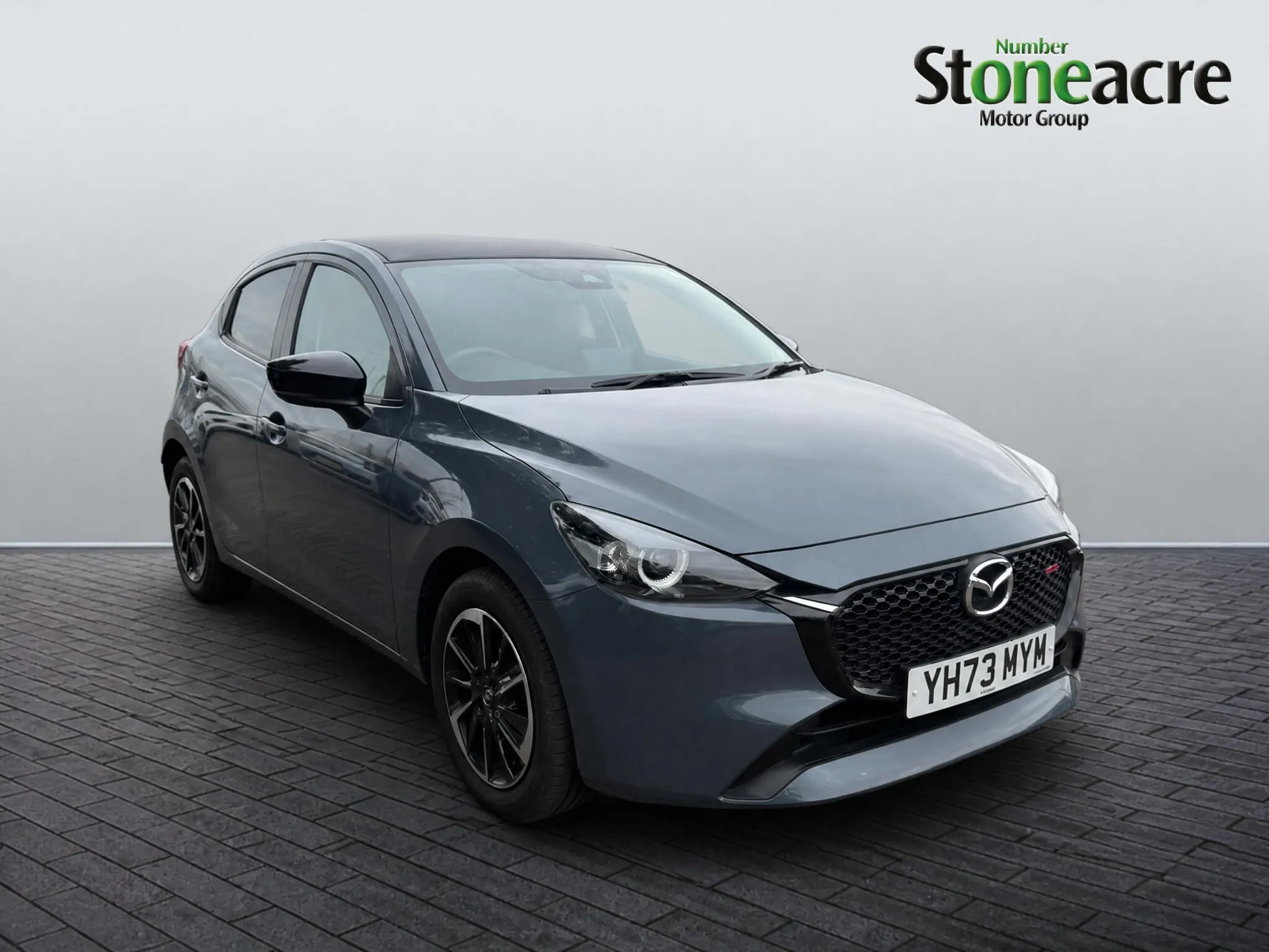 Mazda 2 listing photo