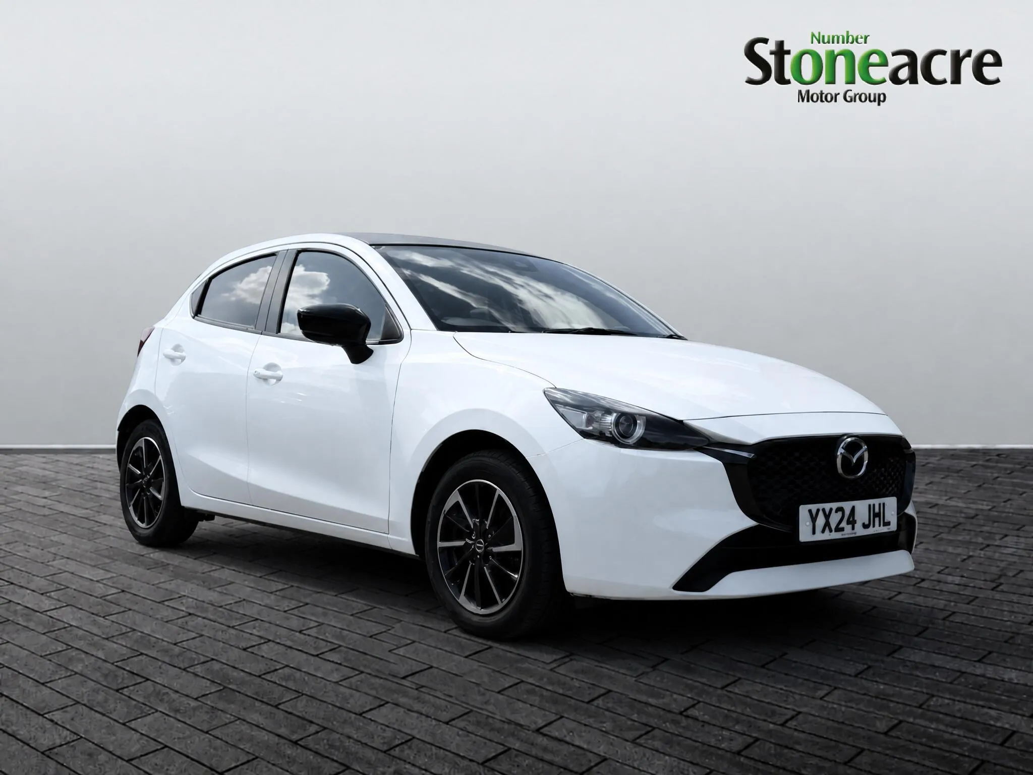 Mazda 2 listing photo
