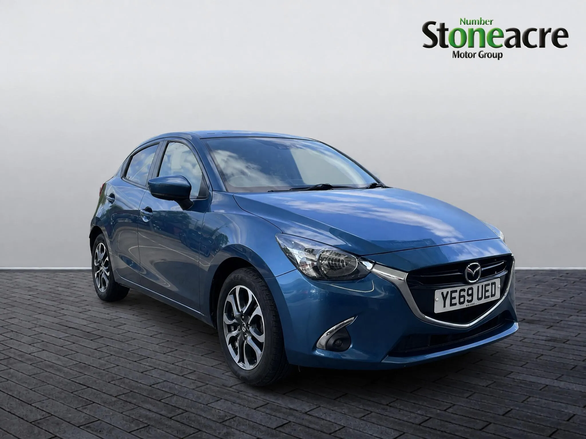 Mazda 2 listing photo